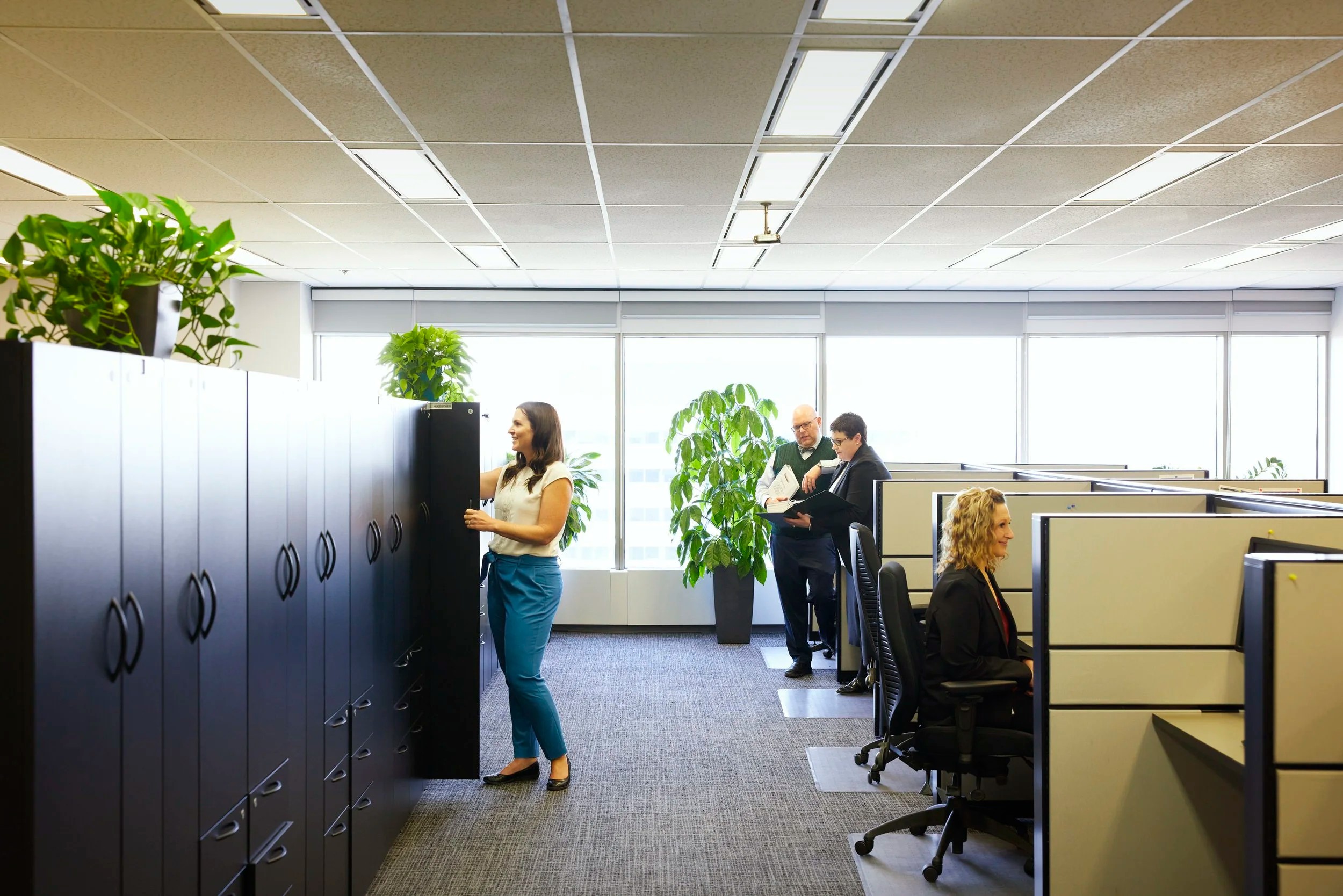 At the filing cabinets