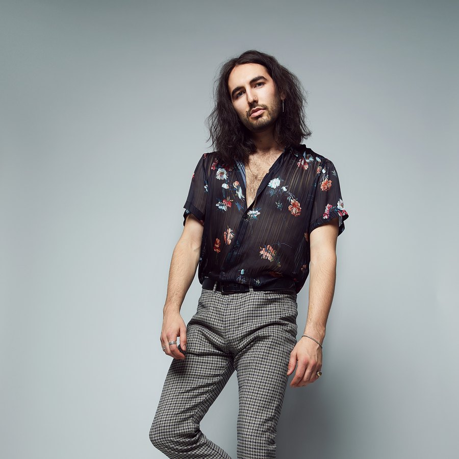Carter and the Capitals — one of the band on his own in a floral shirt, Edmonton