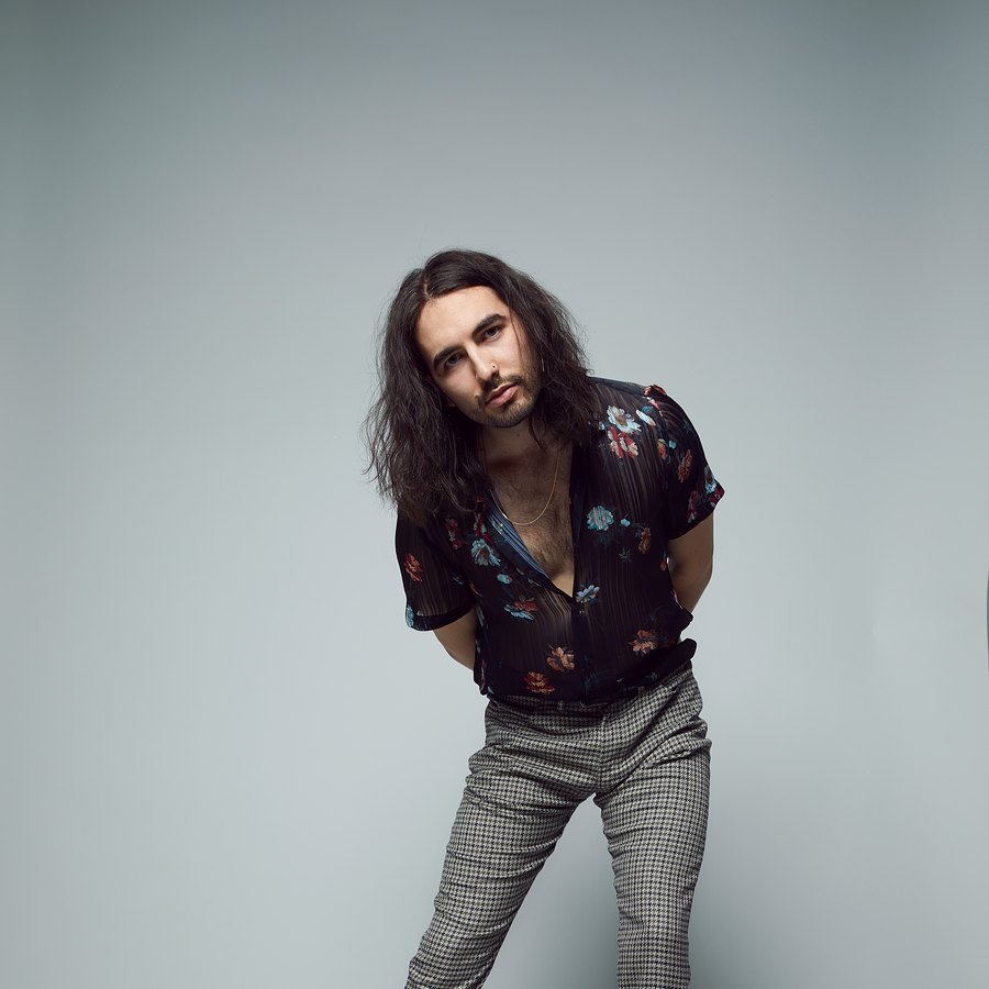 Carter and the Capitals — one of the band on his own, leaning in, Edmonton