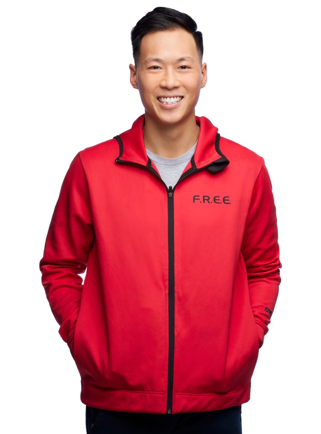 A man in a red zip jacket