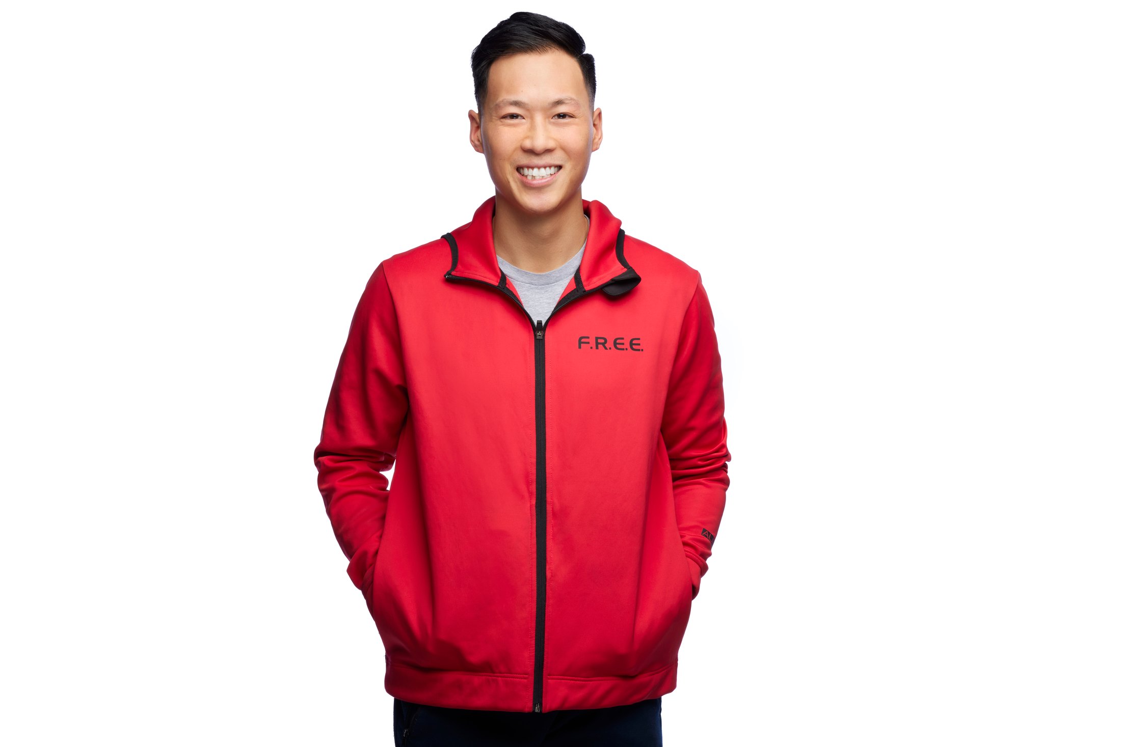 A man in a red zip jacket