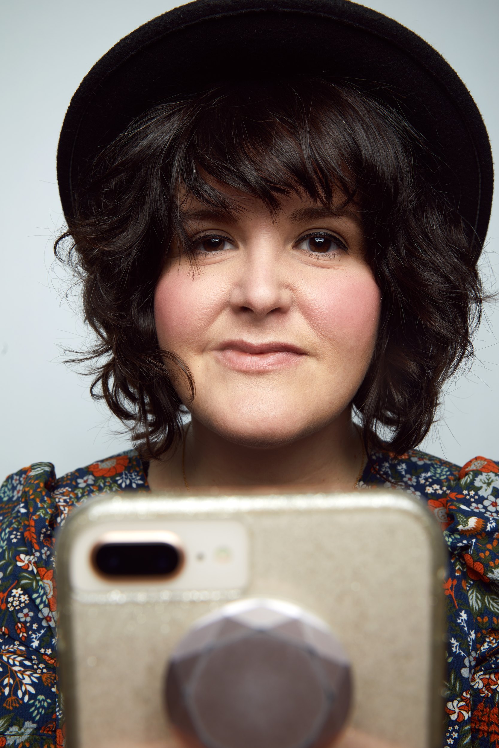 The same session in colour, a phone held up to the camera