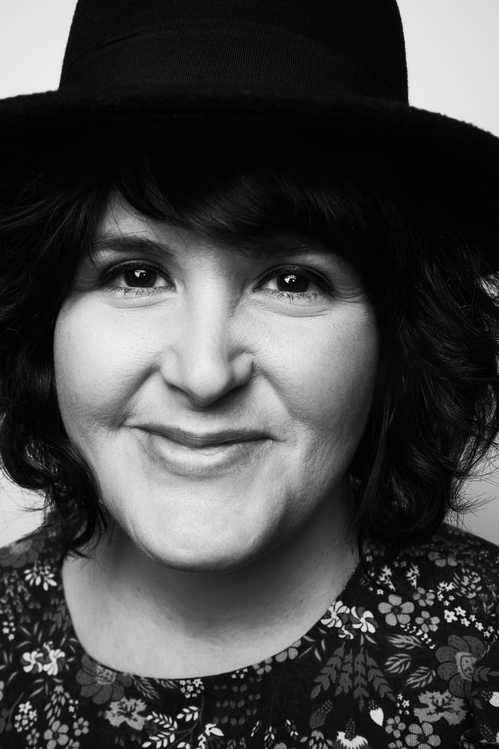 The same session, black and white, a wide smile