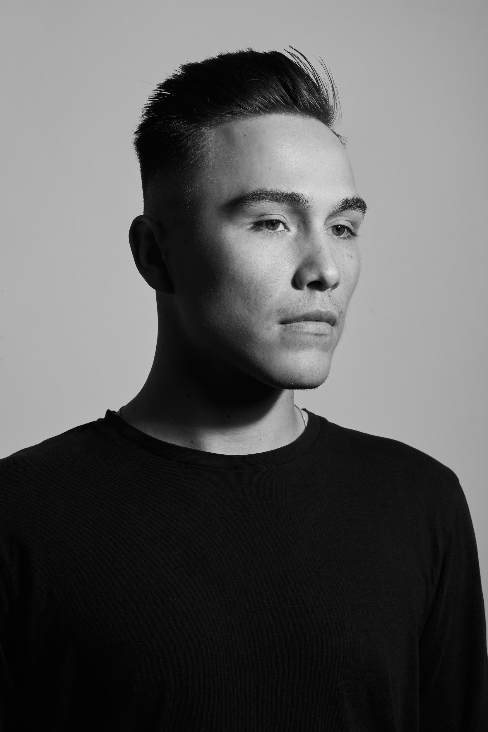 The same session in black and white, a black tee, straight on