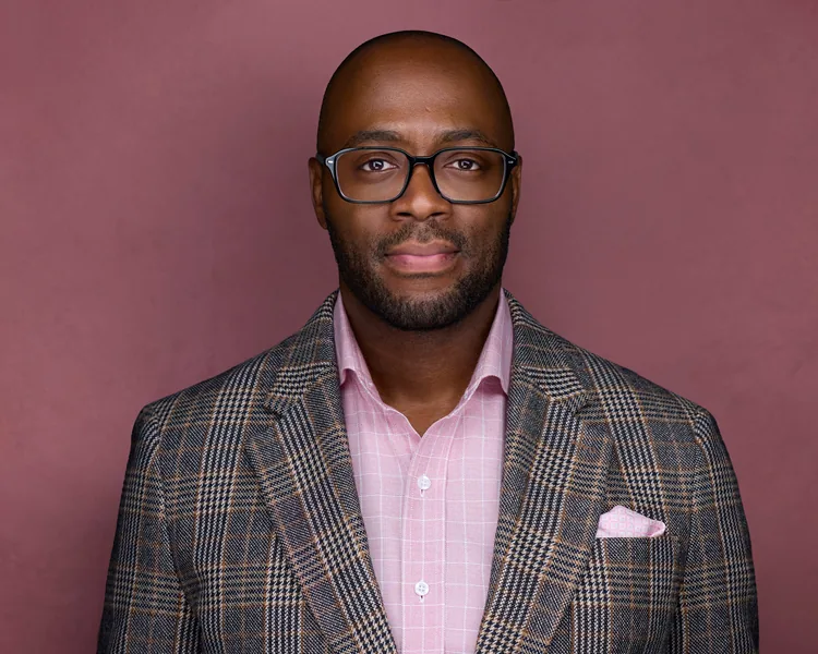 A plaid jacket on a pink background, same session