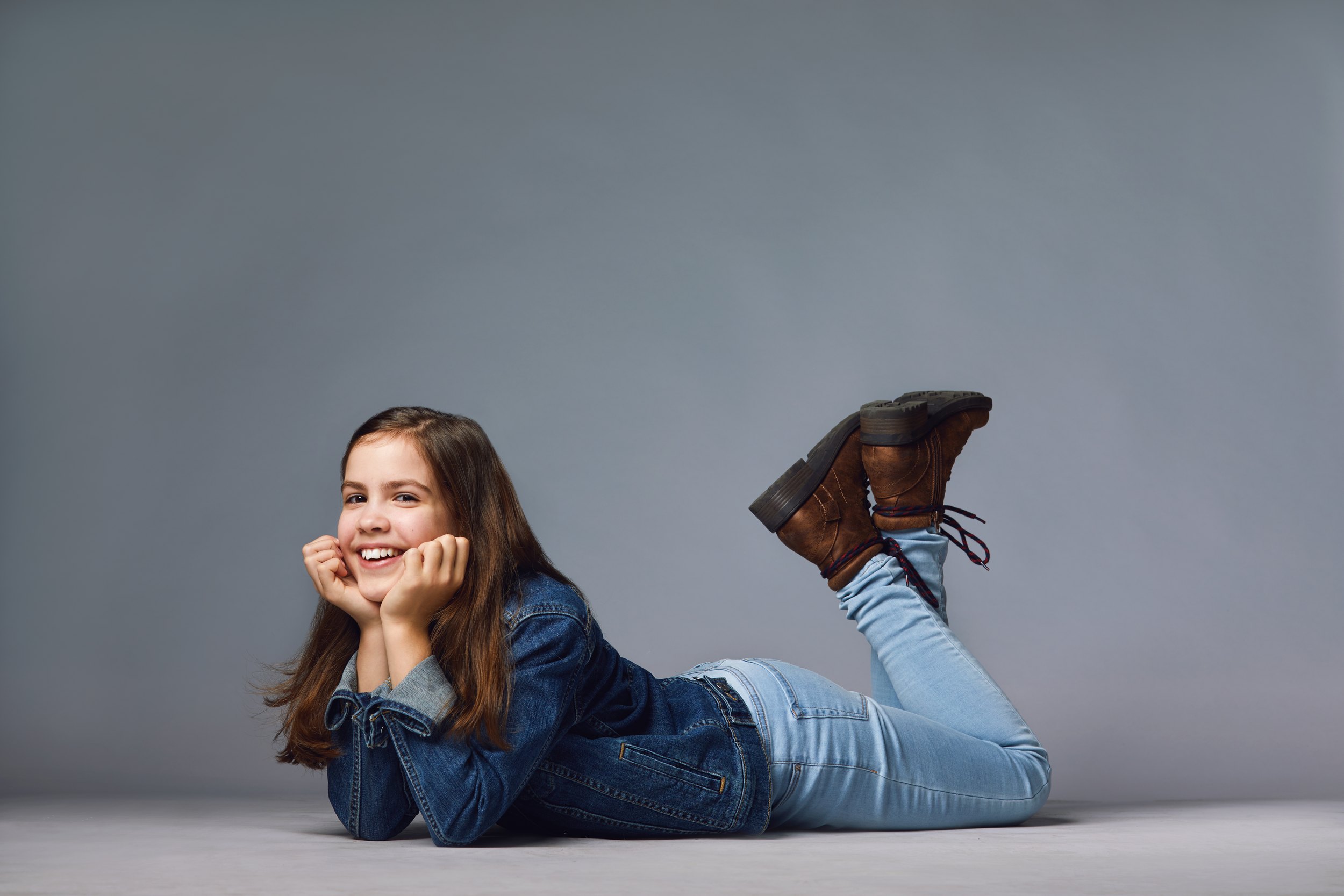 The same session, lying down, chin on her hands