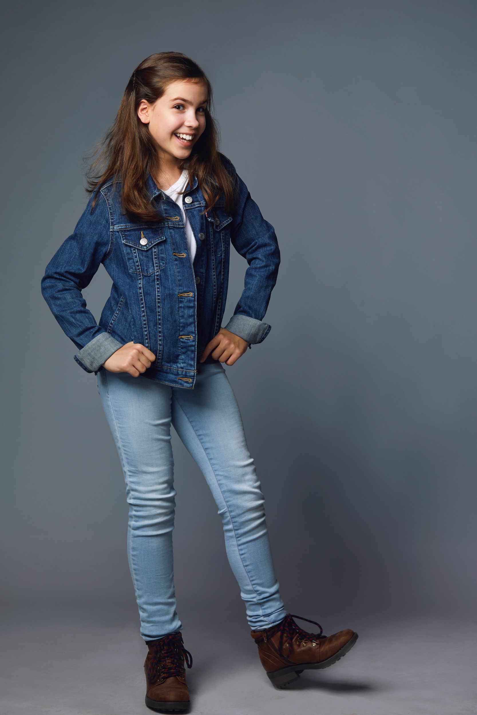 The same session, a denim jacket and jeans, head to toe on grey