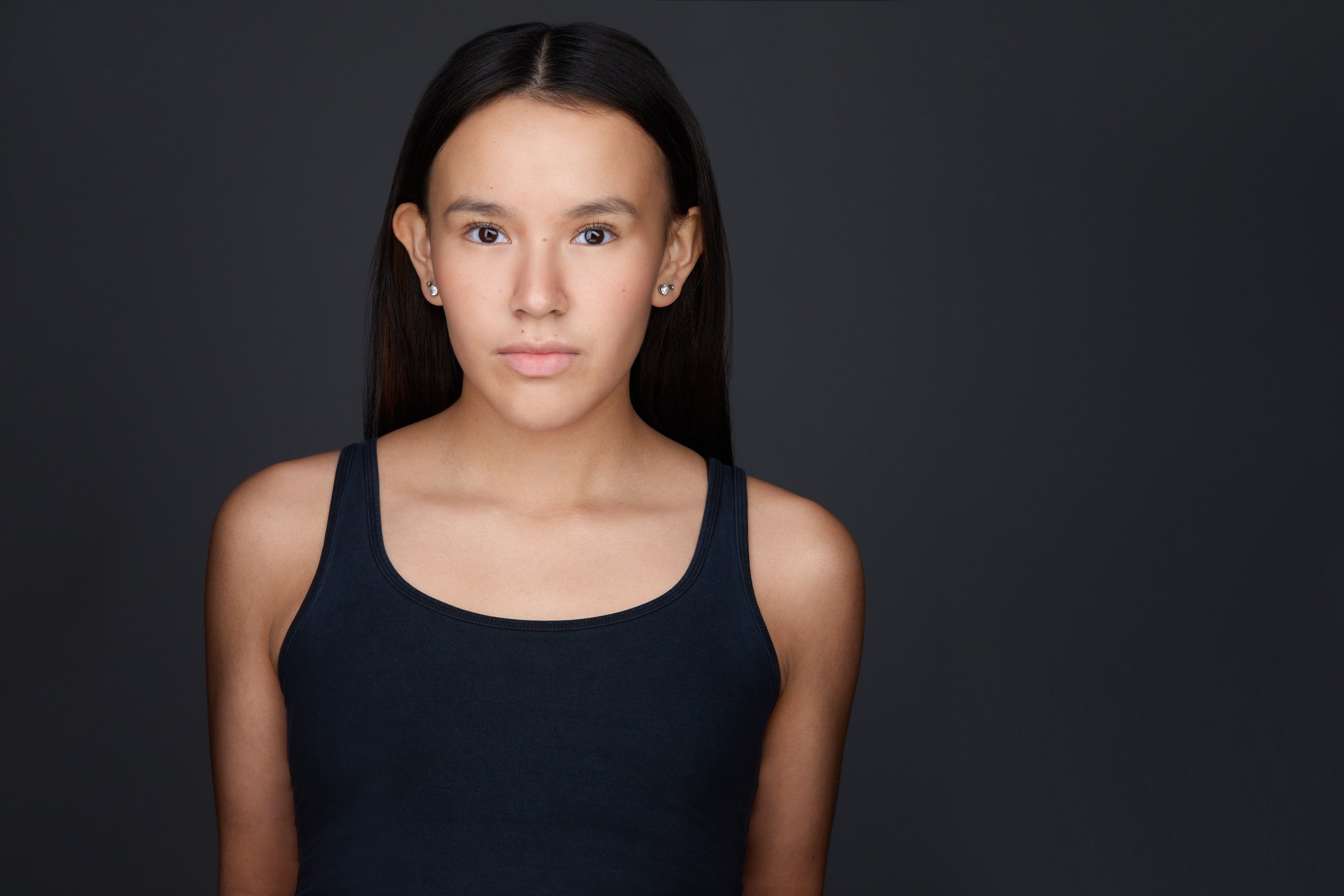 Kids and teens headshot: a black tank against black