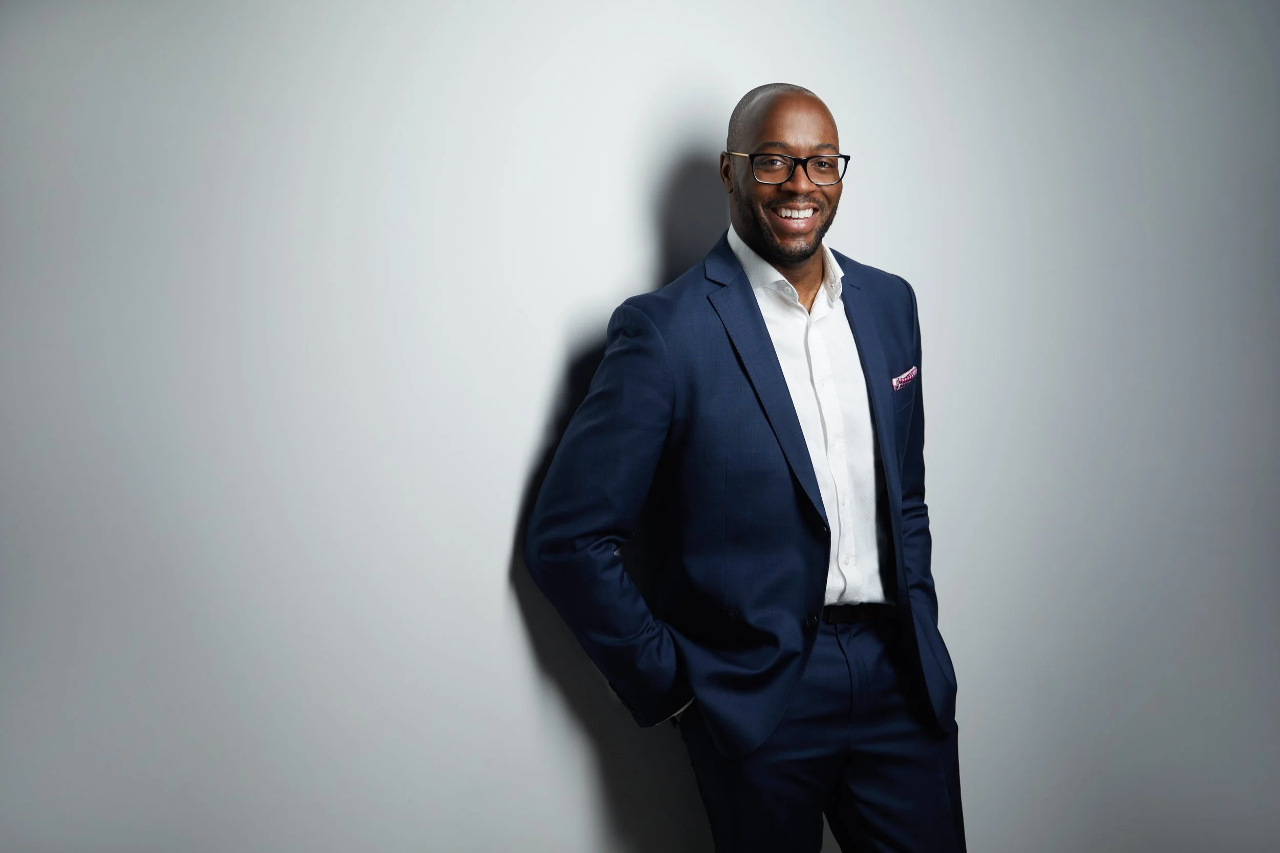 Business portrait against a white wall, Edmonton studio