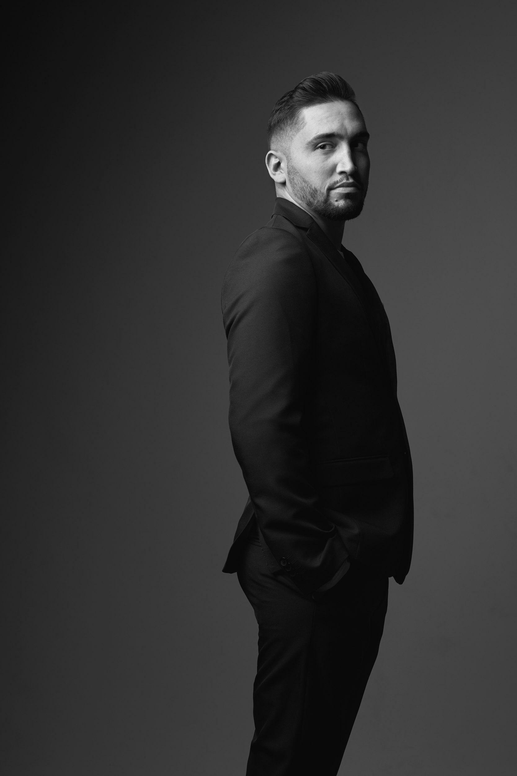 Personal branding portrait in black, standing