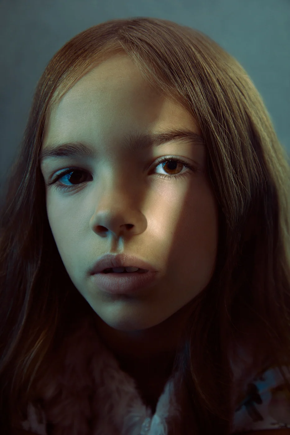 Portrait from Ryan Parker’s Slice of Light series — a single slice of light across the face, Edmonton