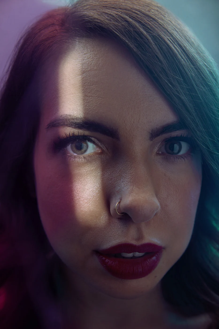 Portrait from Ryan Parker’s Slice of Light series — a single slice of light across the face, Edmonton