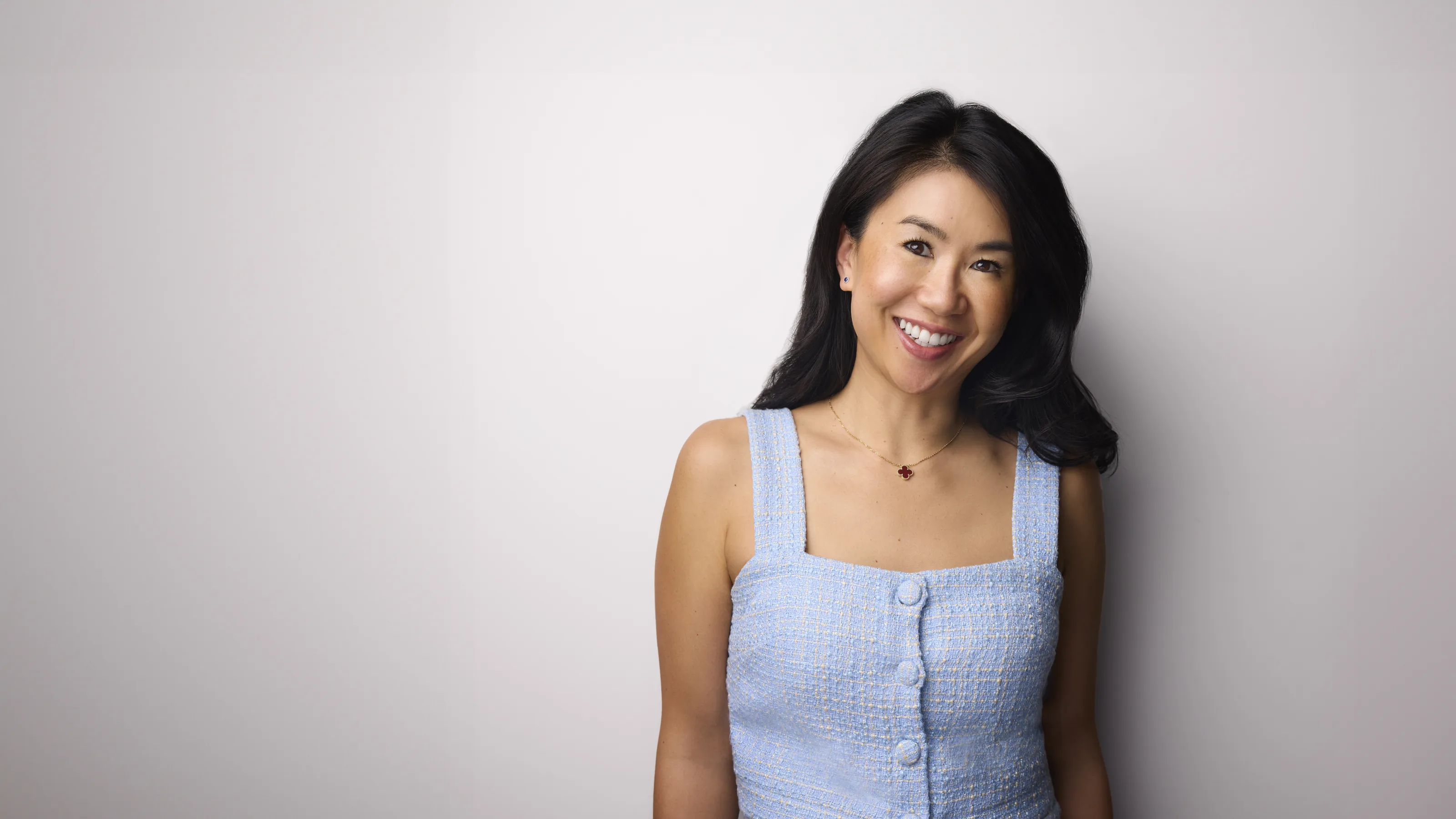 Stephanie Liu, business headshot on a light grey backdrop, Edmonton studio