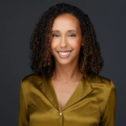 A corporate headshot cropped round for a profile picture