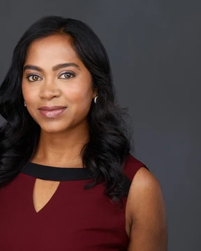 Irene P., headshot cropped tall for a team page
