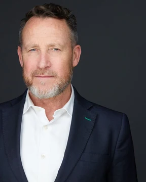 Norrie C., headshot cropped tall for a team page