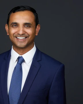 Shyam G., headshot cropped tall for a team page